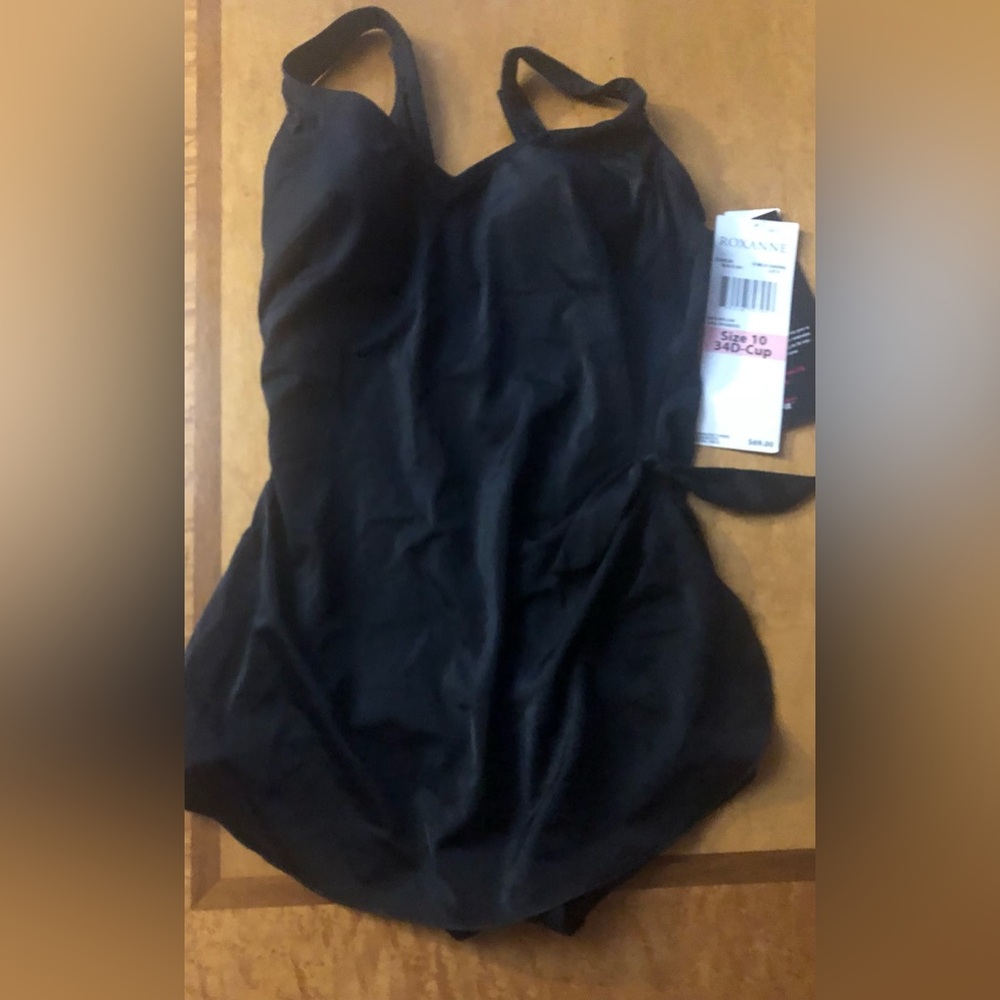 NWT. One piece   ROXANNE. Size 10.